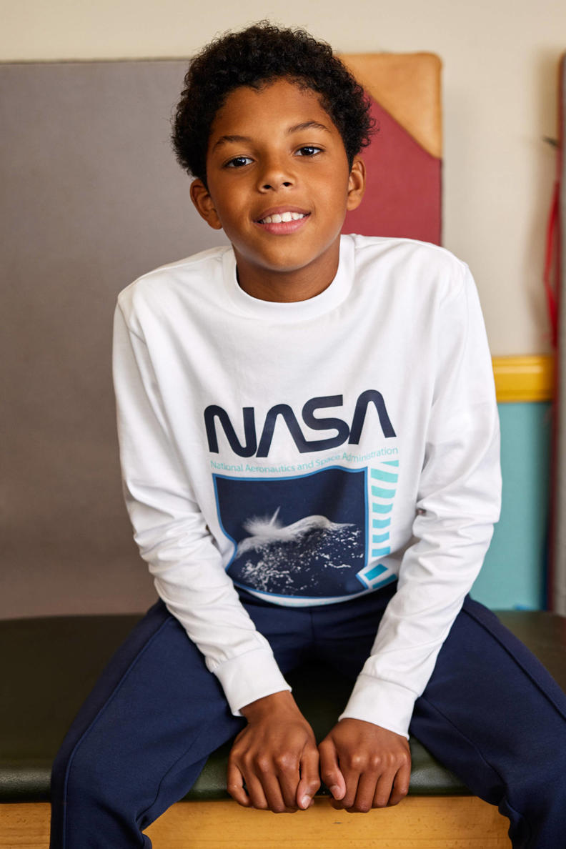 White crew neck shirt with nasa print